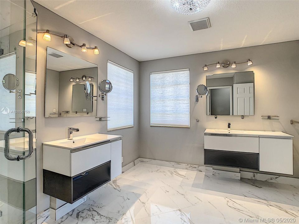 modern remodeled master bath with luxury finishes