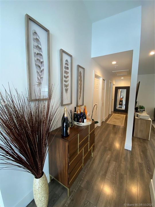 HALL TO THE 3 BEDROOMS + BATH