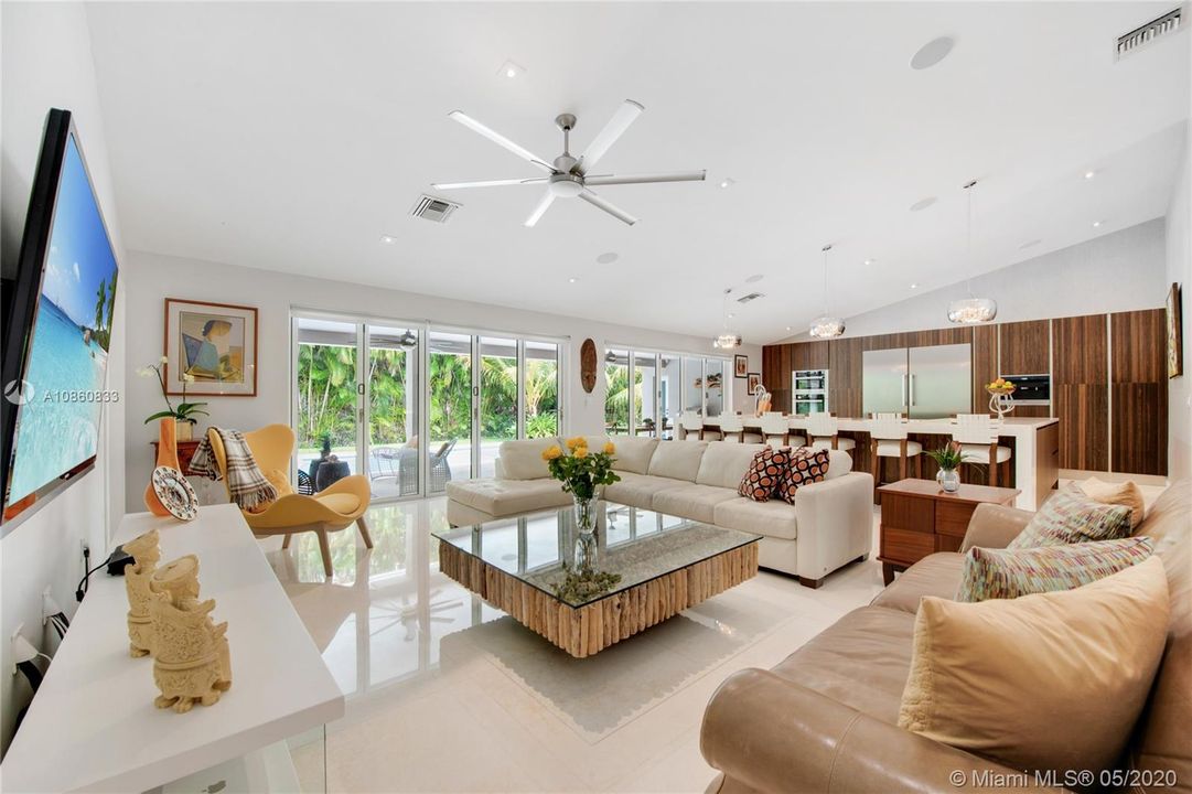 Family Room And Kitchen With Pool & Garden Vistas