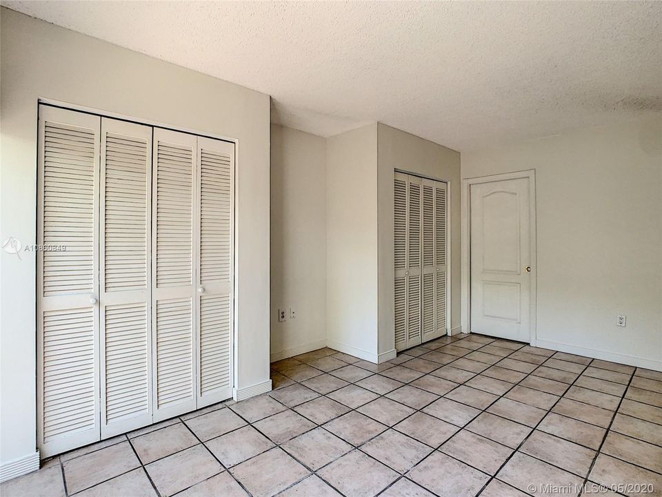 3rd bedroom- 2 spacious closets/ Den with door to Laundry room