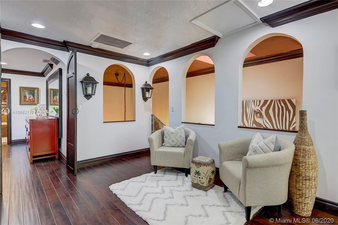 Open Sitting area separates master from guest room