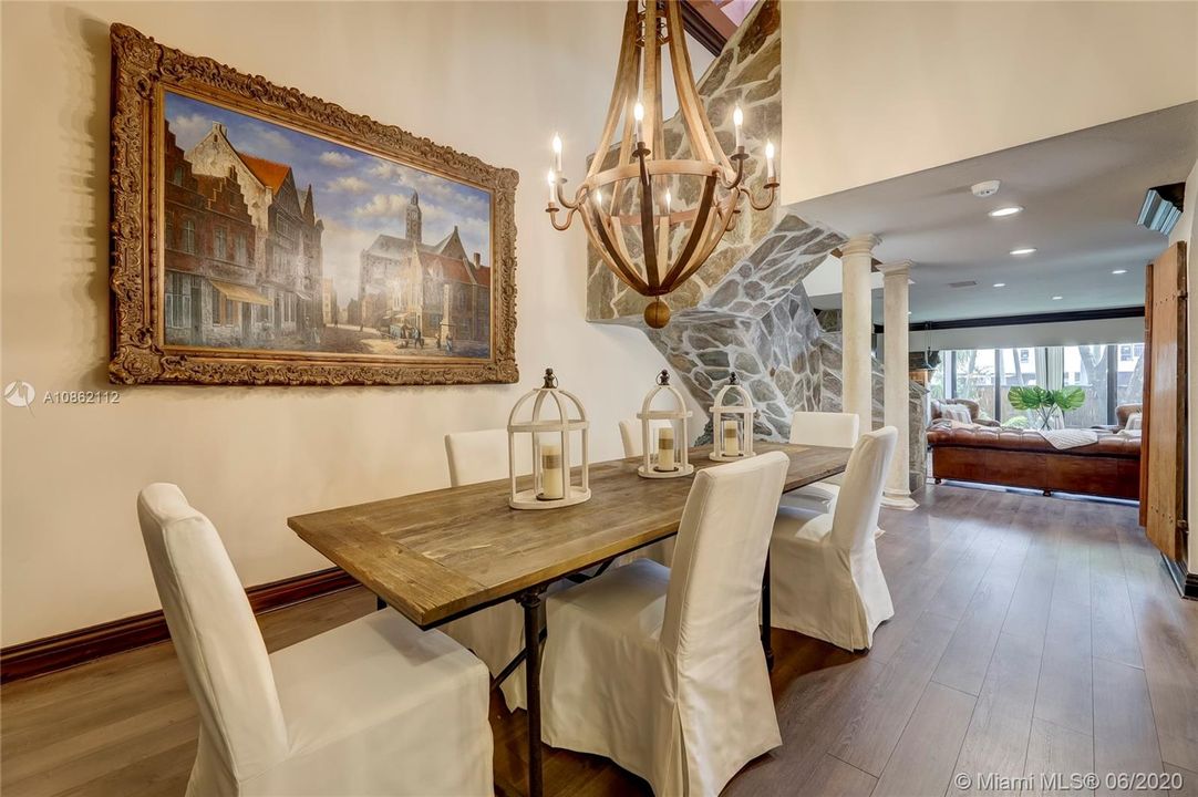 Large Dining Room just off the kitchen w/ high ceilings