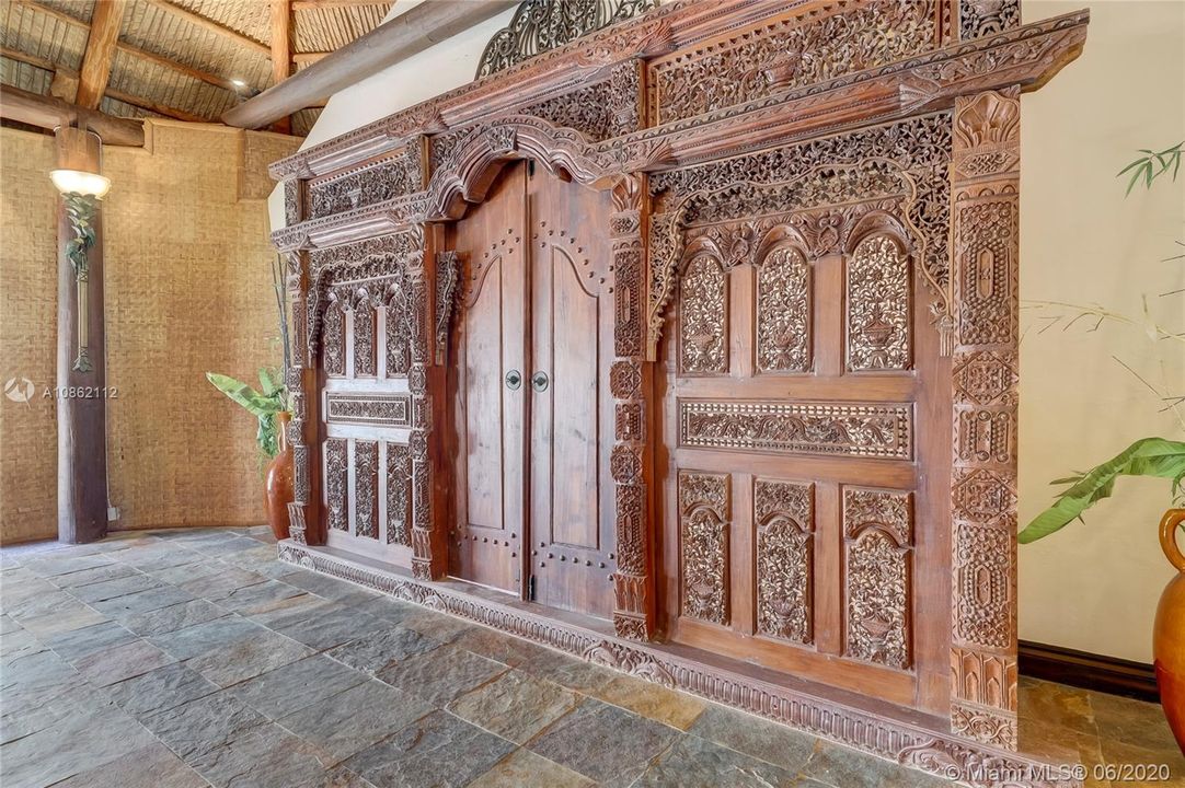 Hand carved imported doorway takes you to the guest suite (second master downstairs)