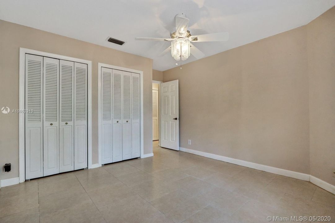 Bedroom 2-Closet offers Built-In Cabinetry