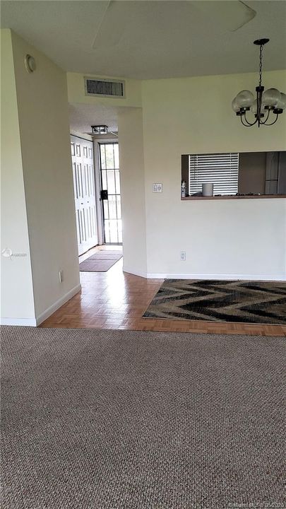 Foyer entrance, dining area, living room