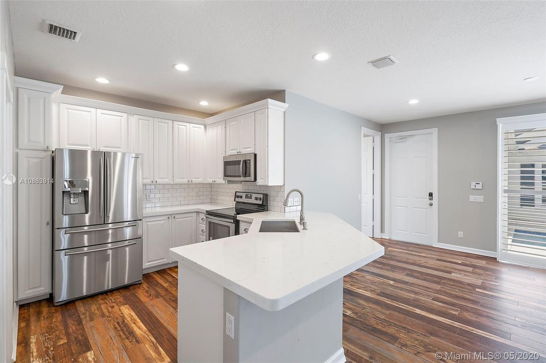 Quartz Countertops & Subway Tile Backsplash