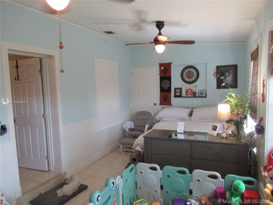 FAMILY ROOM 23'X11' PRESENTLY BEING USED AS BEDROOM