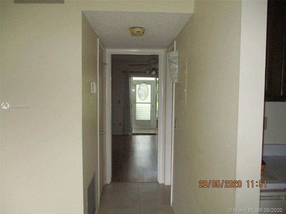 entrance to bedroom with laminated floors