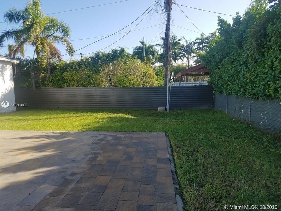 Backyard is fenced for privacy  large area patio area to enjoy quietly or entertain