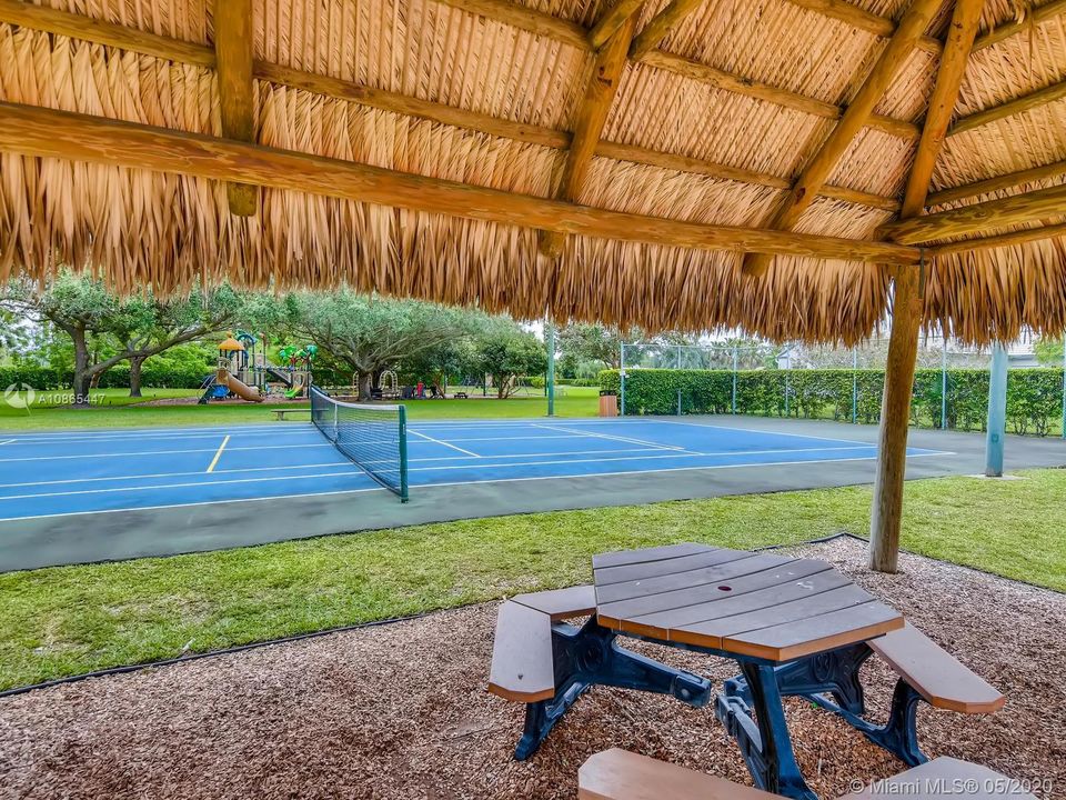 Community tennis courts, play area and picnic area :)