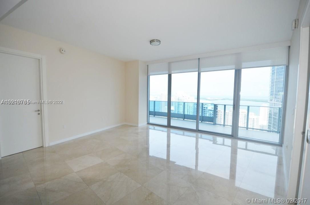 Living room with extraordinary views of Brickell Key and Key Biscayne