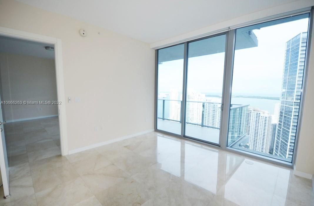 2nd Bedroom: Beautiful views and balcony access.