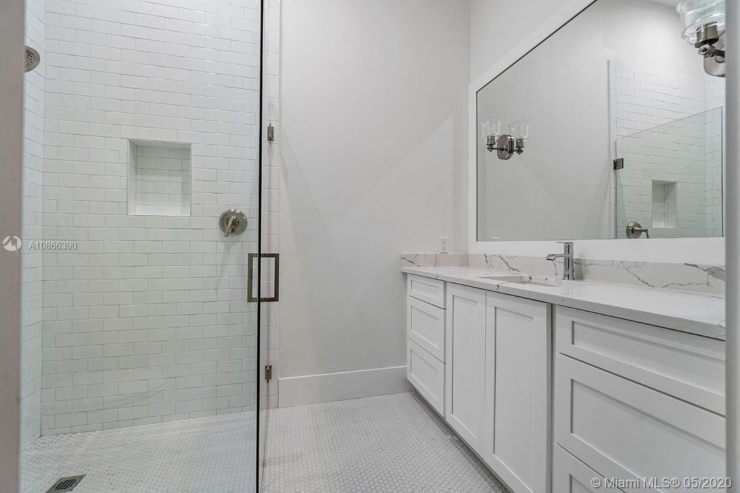 Guest suite bathroom with beach entry shower