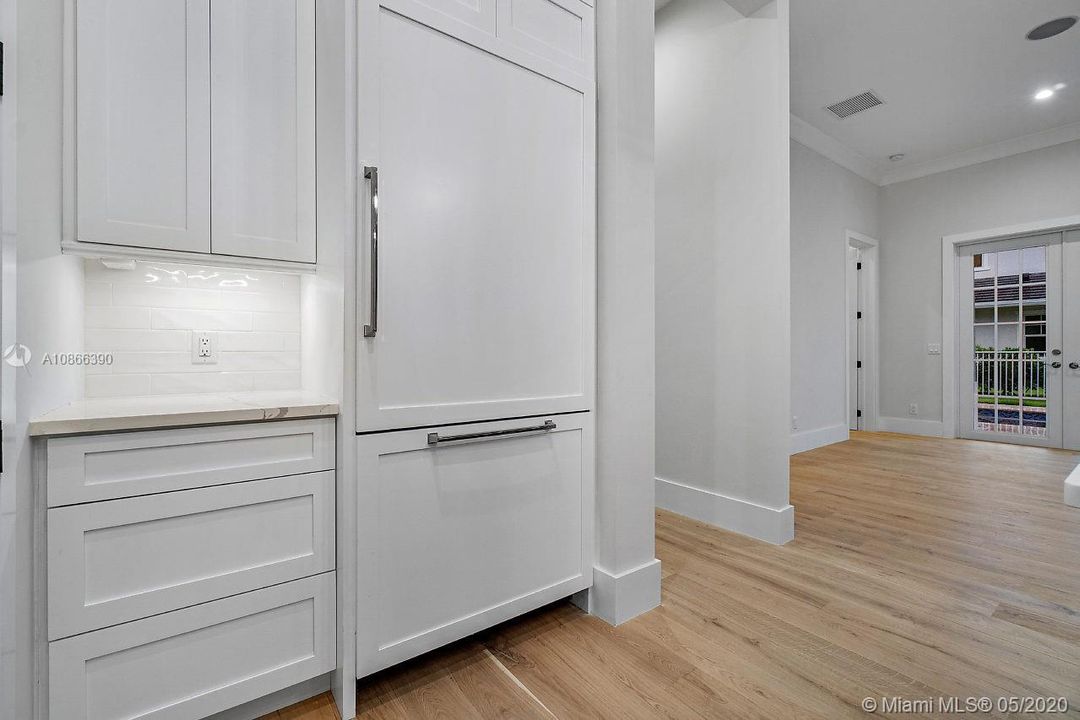 Thermador appliances, with cabinet panel overlays