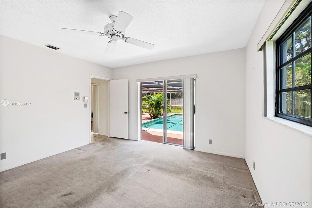 1029 W Palmetto Road Boca Baton FL 33486 - master bedroom w view to pool