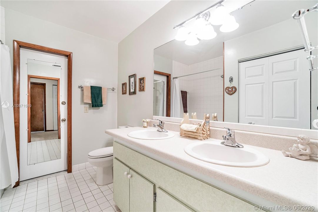 Guest bath with access to family room