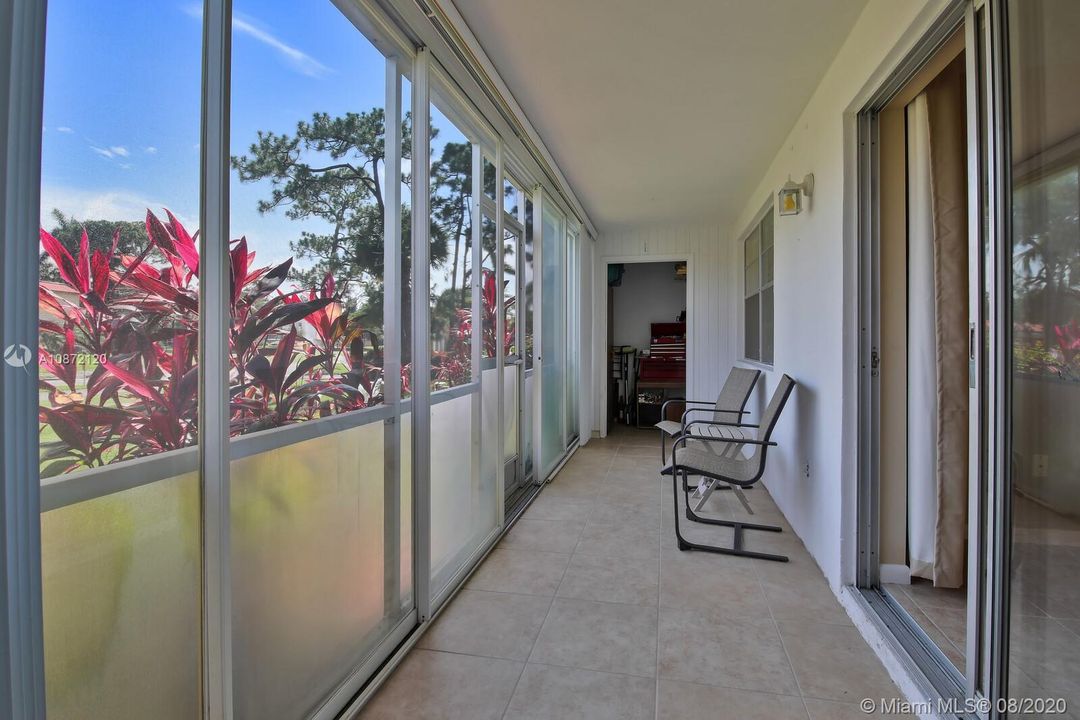 Covered Screen Patio with two storage closets