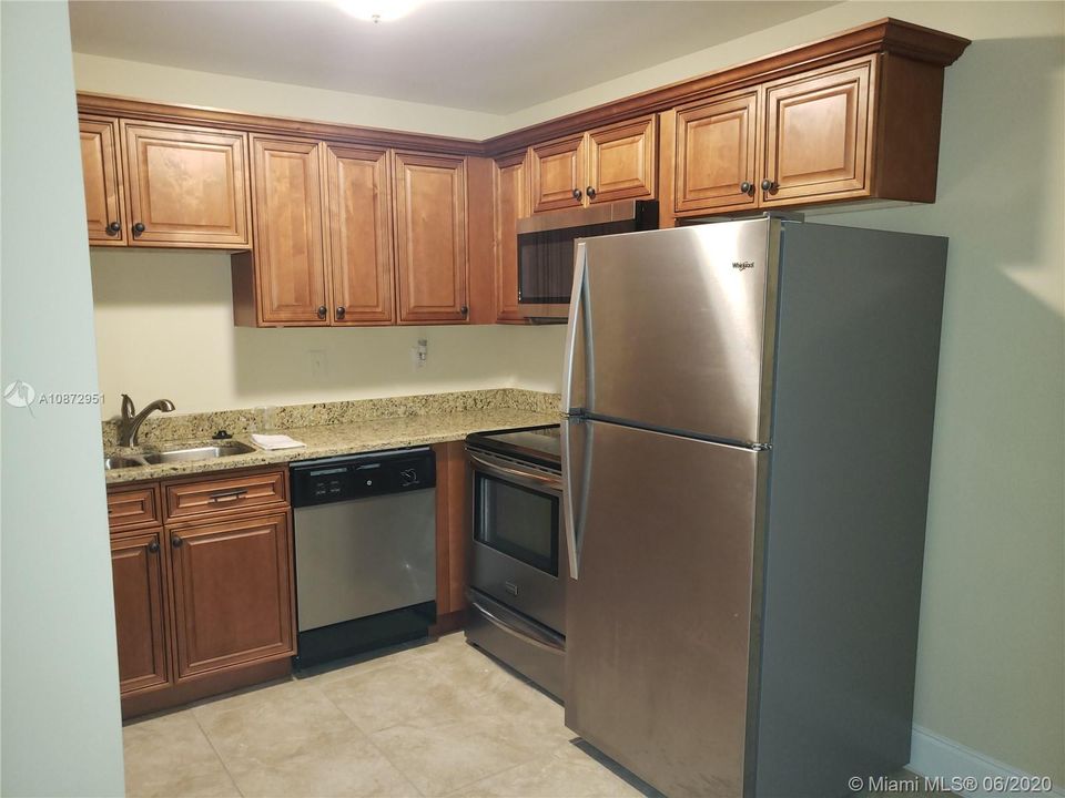 Beautiful cabinets and stainless appliances!