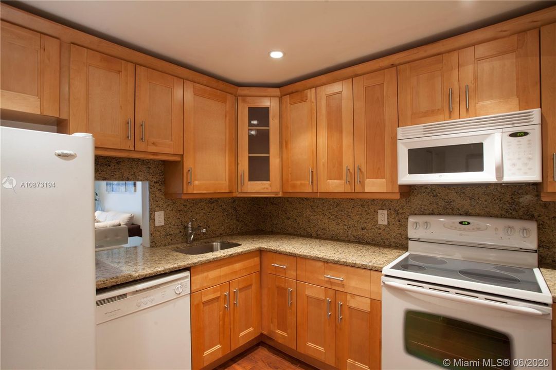 Replaced appliances in white: Refrigerator, Dishwasher, Microwave, Electric Range, Wall Oven