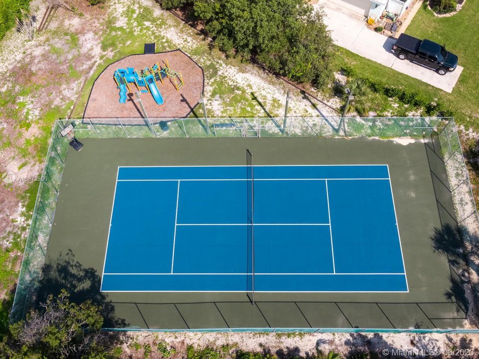 Enjoy a game of Tennis while the Kids Play:-)