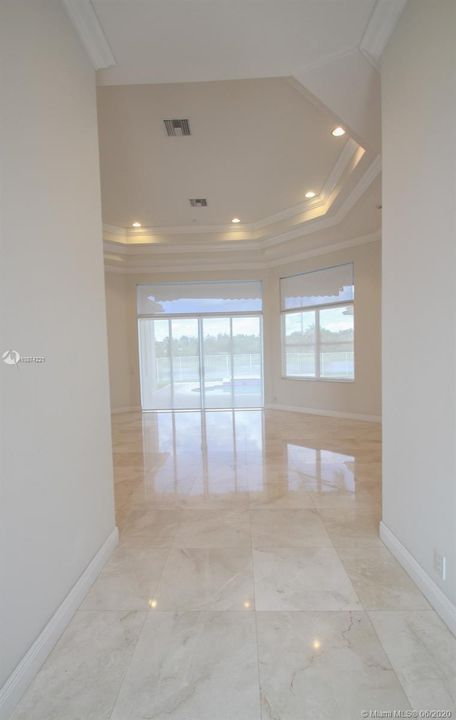 ELEGANT ENTRANCE TO LIVING ROOM