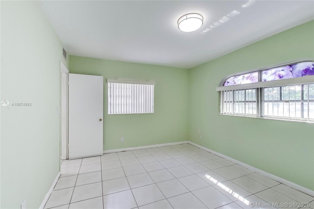 Master Bedroom overlooking patio and garden