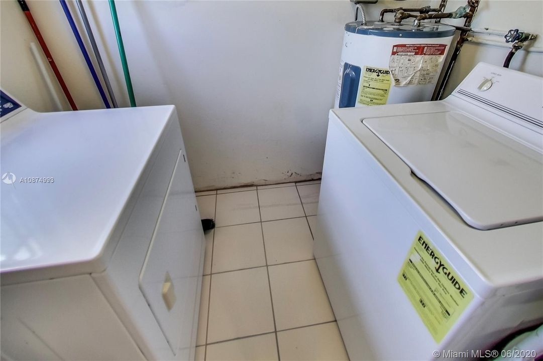 Laundry and storage room with shelving on top - Unbranded 360 VT at: www.rem.ax/16992swunb