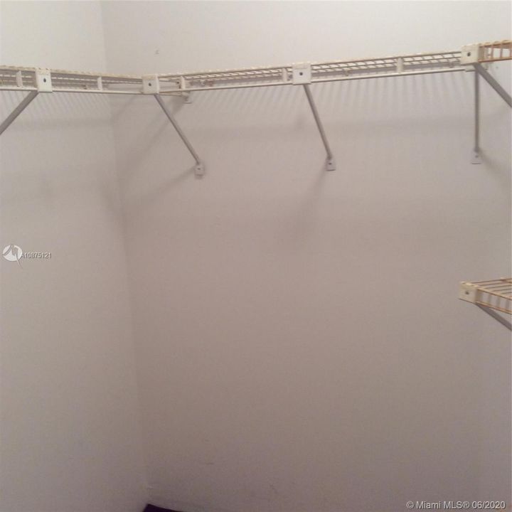 Master walk-in closet plus wall to wall