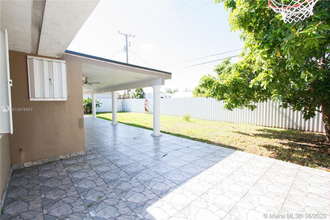 Large patio and yard! WHITE FENCE!