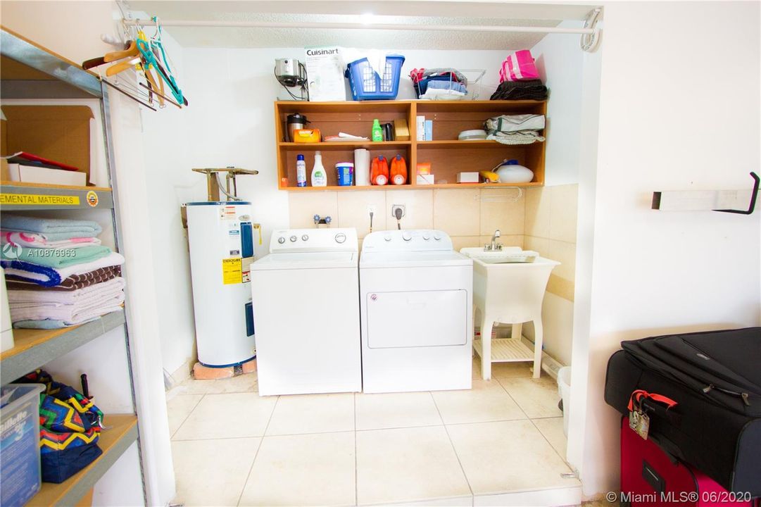 Utility and laundry area inside garage!