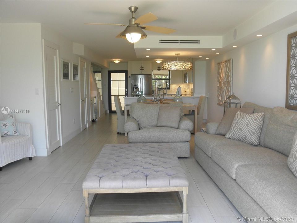 VIEW OF THE FIRST FLOOR OF TOWNHOUSE FROM THE BACK PATIO