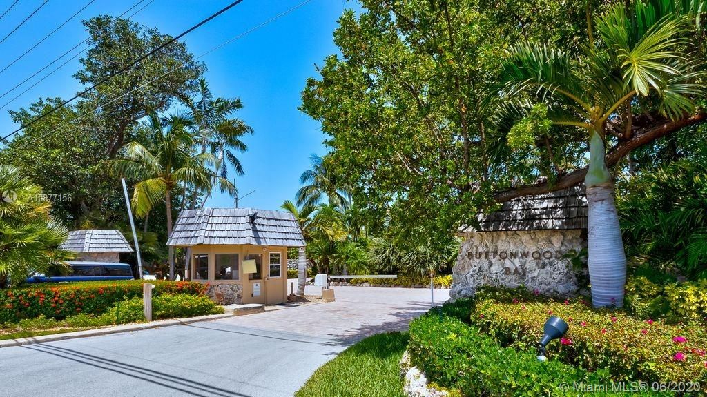 SECURITY LOCATED IN THE ENTRANCE OF BUTTONWOOD BAY CONDOMINIUMLOCATED ON 96000 OVERSEAS HIGHWAY