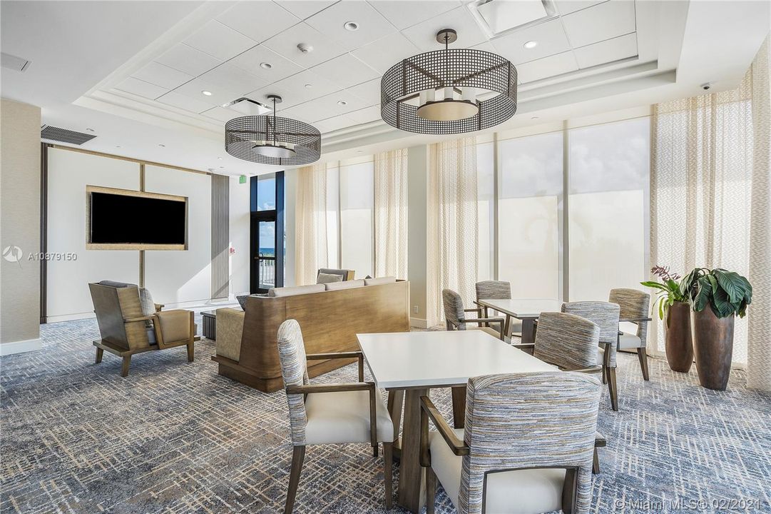 Part of Game Room Entertainment center on south end of lobby.  Complete with pool table, ping pong, "Foosball", Large Screen TV and card tables