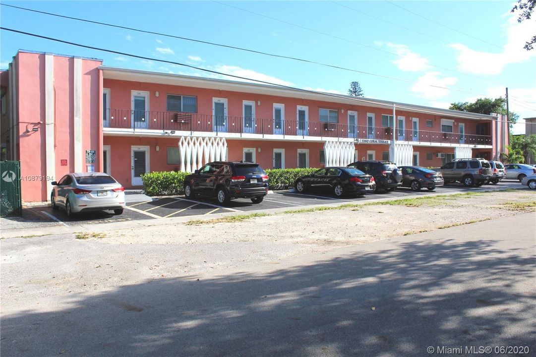 Parking for up to 2 cars, one behind the other, is allowed for this unit. The 2nd car can be parked between the sidewalk and the street on the gravel surface.