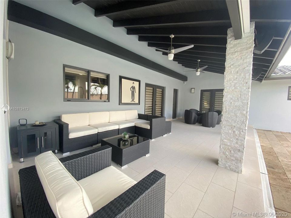 Patio covered terrace with access to family room, dining room. cabana bathroom and master bedroom.