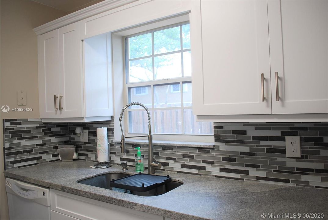 Kitchen with Window Overlooking Patio