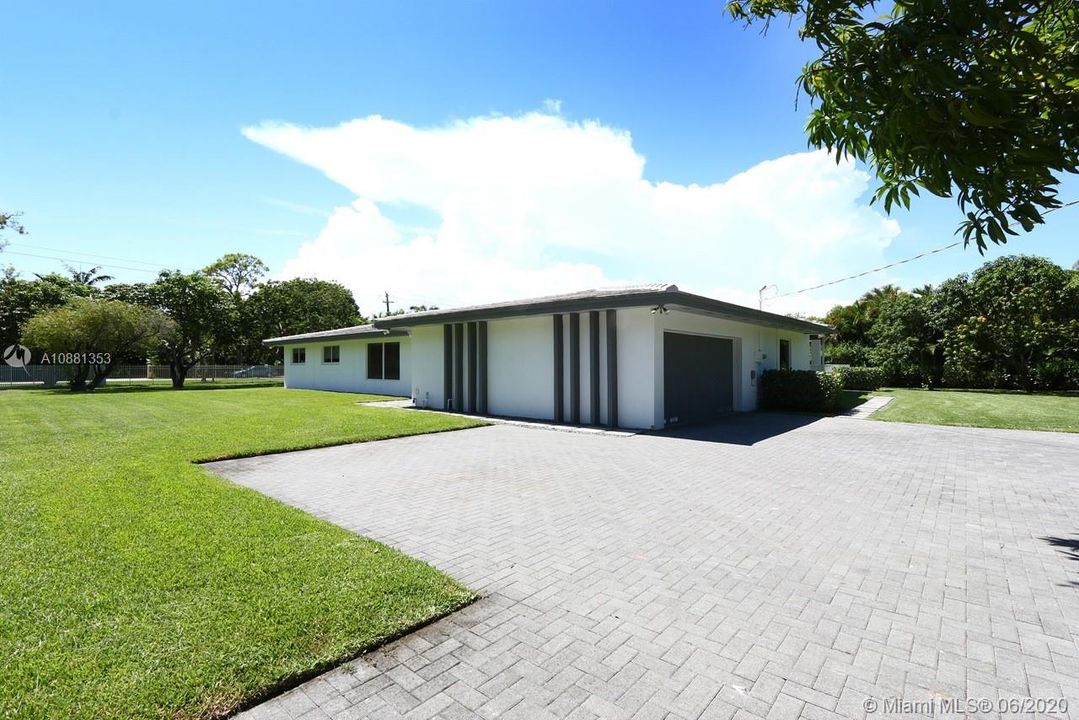 Ample driveway & 2 car garage