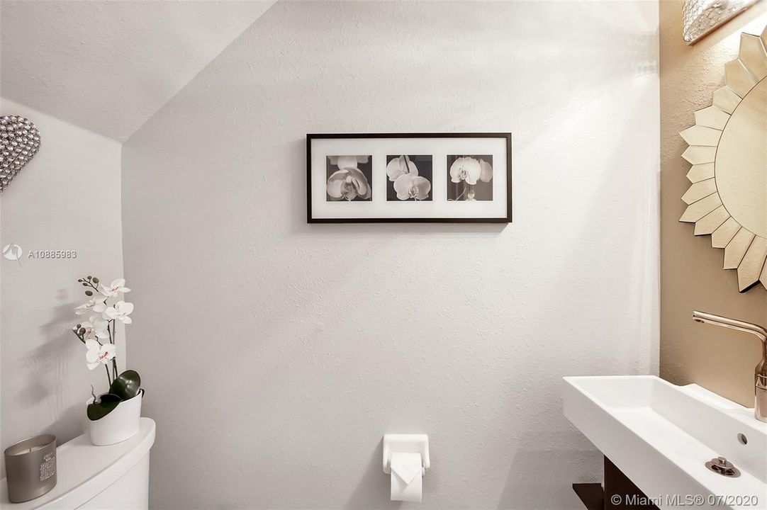 half bath, new toilet and sink/cabinet
