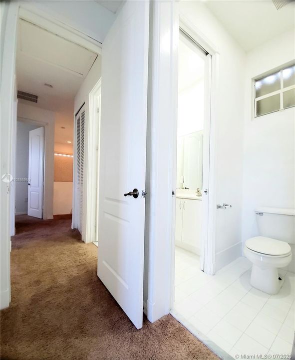 Entry into upstairs bathroom from bedroom #3 and from passage way