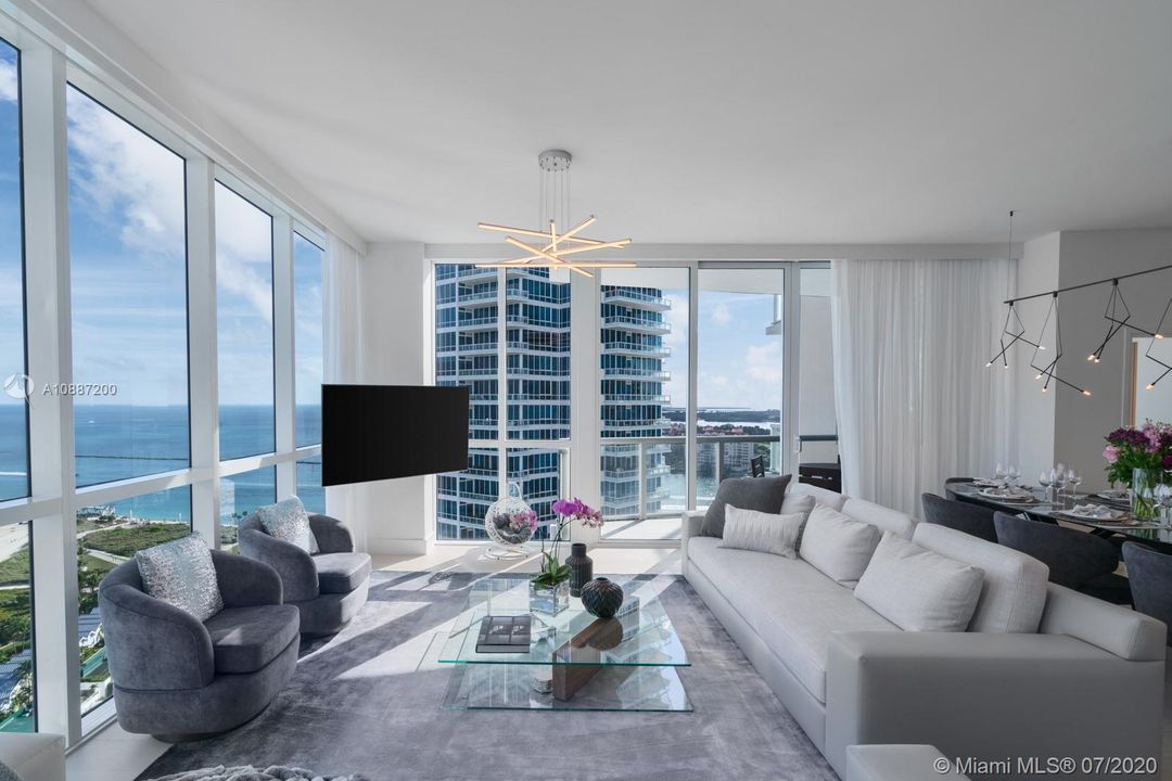Living room with SE view of the Port and South Pointe Beach