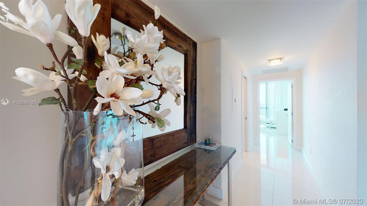 hallway leading to west end of unit