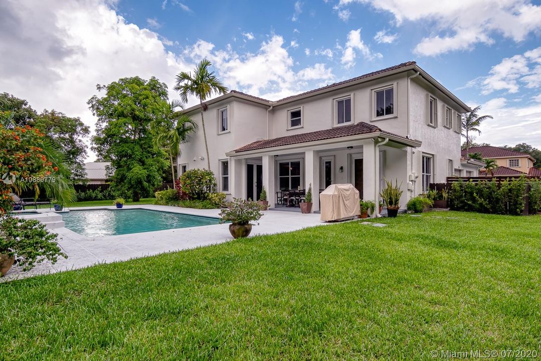 Large backyard with beautiful landscaping and pool. Pool and yard maintenance included in rent. Almost new AC units.