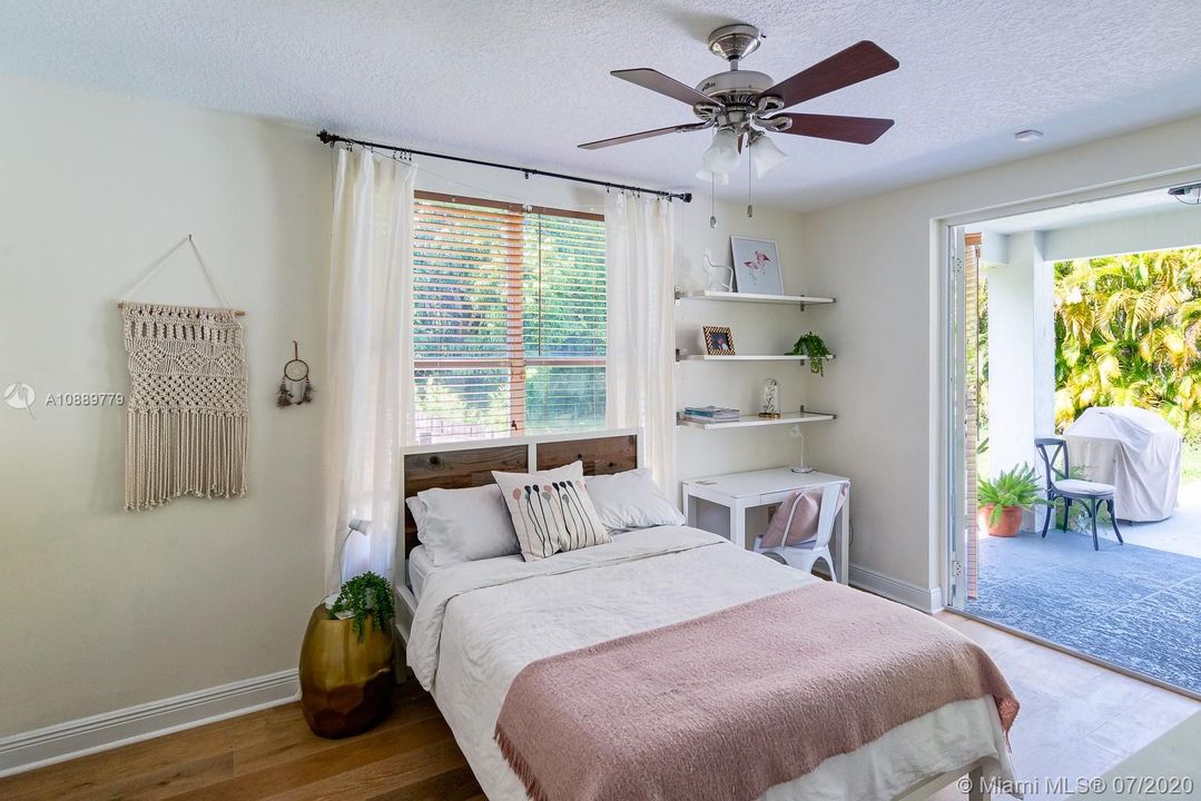 Bedroom in first floor has an independent entry. It is part of a suite with two closets and a bathroom.