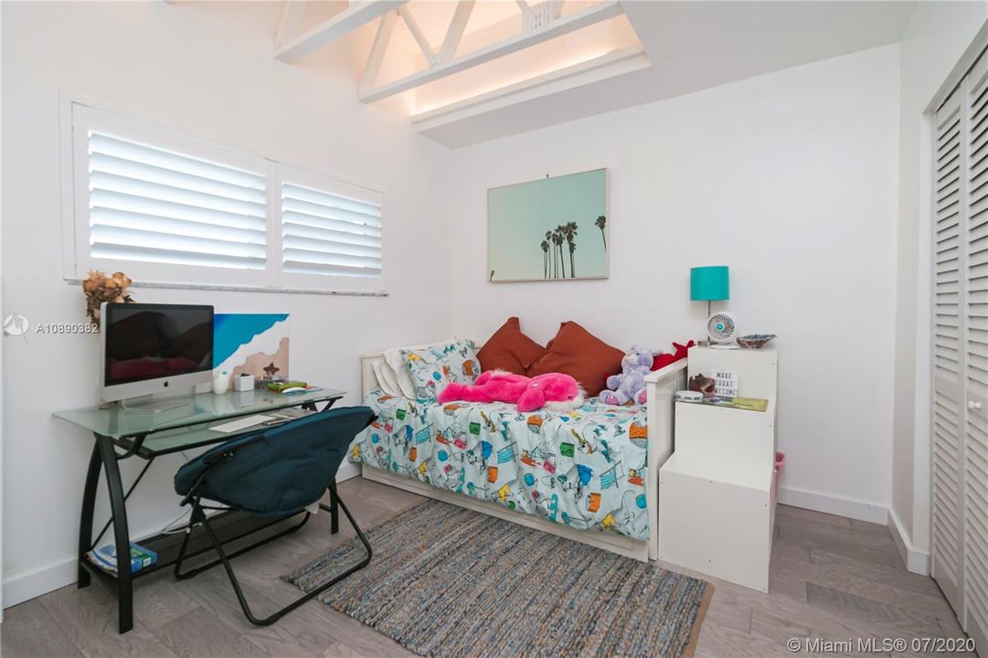 2nd bedroom features vaulted ceiling with color changing led ligthing and an ensuite bathroom for added privacy.