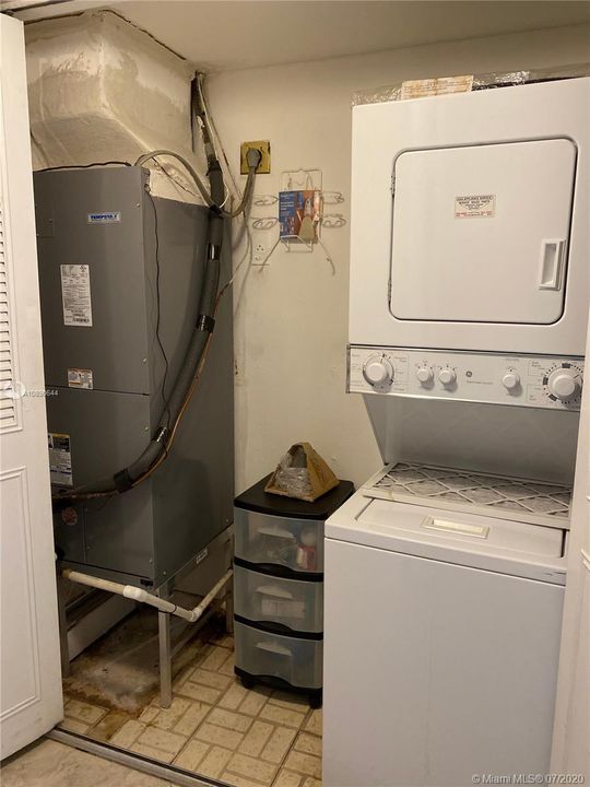 STACKED WASHER AND DRYER INCLUDED