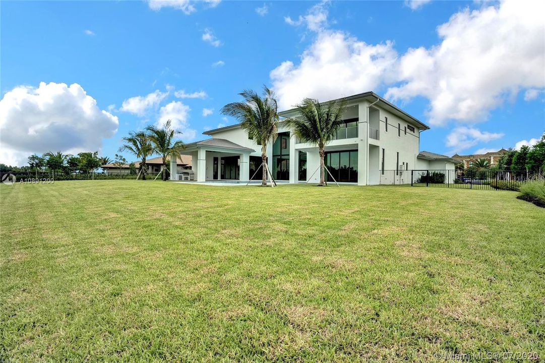 Fully fenced yard with room for a sport court.