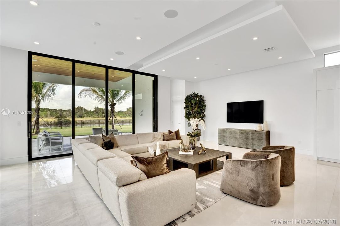 Cabana off family room with patio and summer kitchen access.
