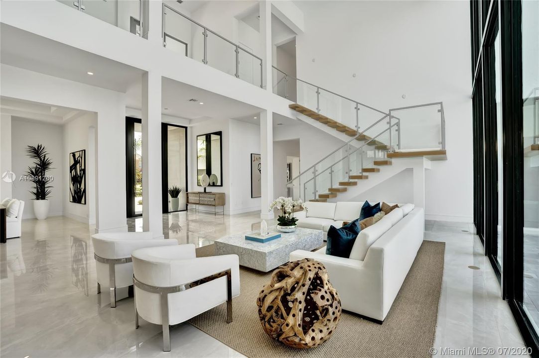 Smooth finished walls & ceilings . Grand 8ft solid interior doors.Cauffered ceilings.