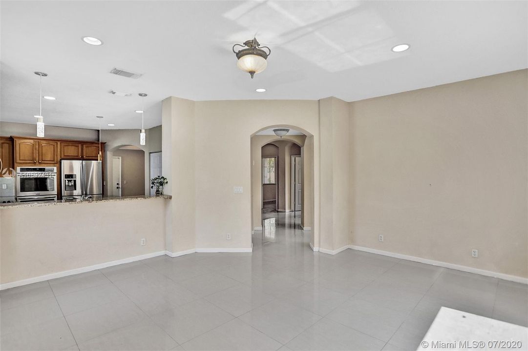 View from family room into kitchen.