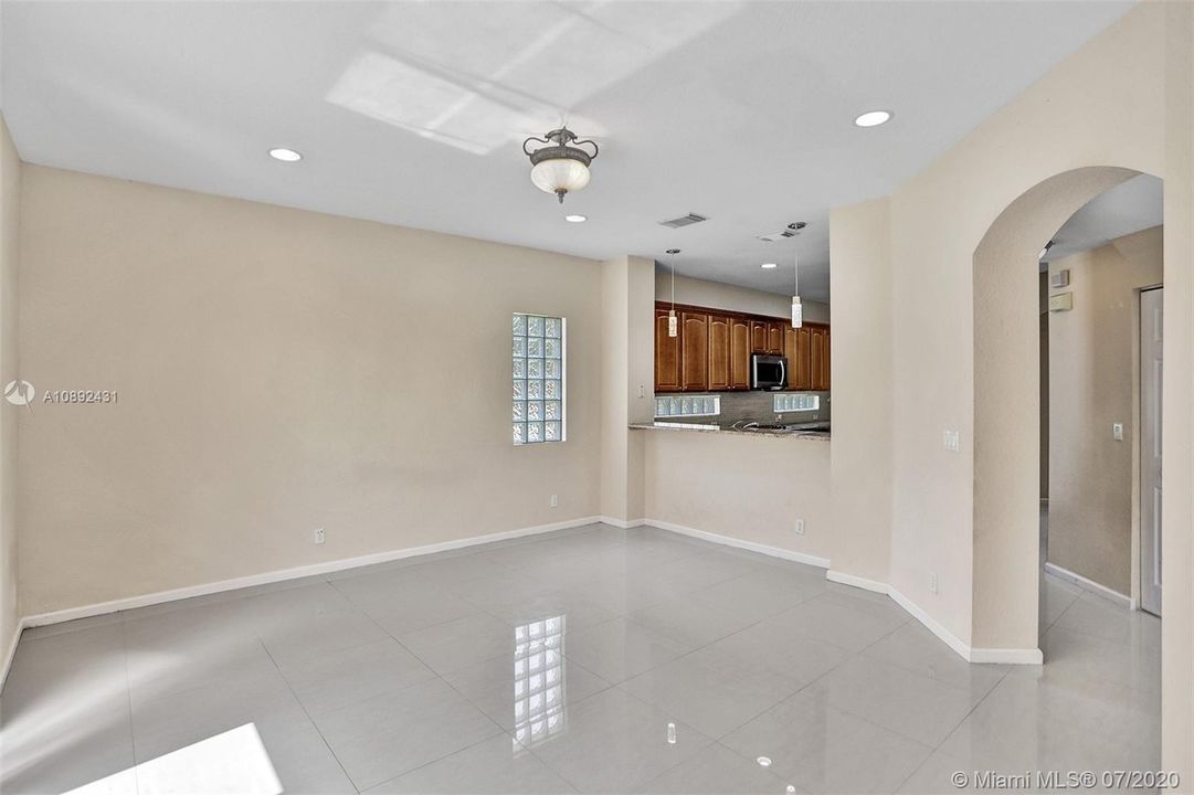 View from family room into kitchen.